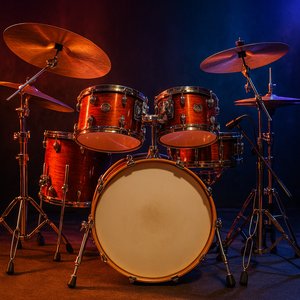 Vibrant Drum Set with Stage Lighting