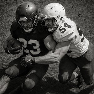 Overhead Tackle: Collision on the Gridiron